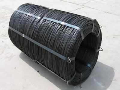 A big coil of oiled black annealed wire ties