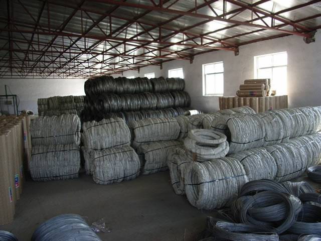 Several rolls of black annealed wires in waterproof paper package in the warehouse.