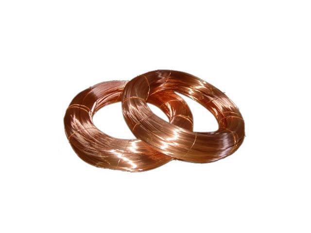 Two rolls of copper steel wires on the white background.