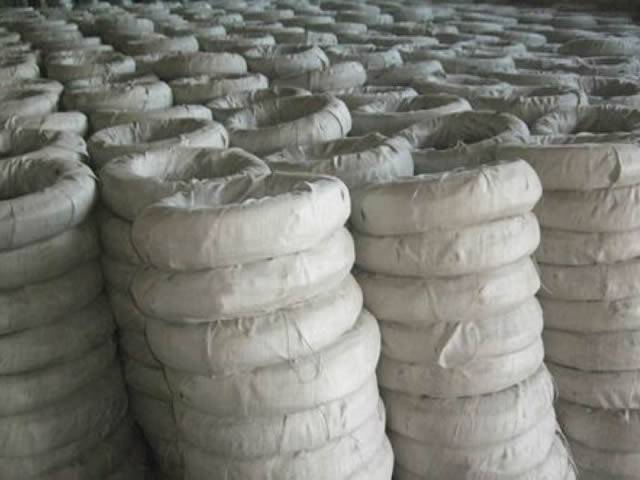 Several low carbon steel wires in woven bag package in the warehouse.