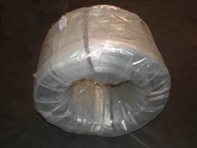 A roll of steel wire in plastic film package.
